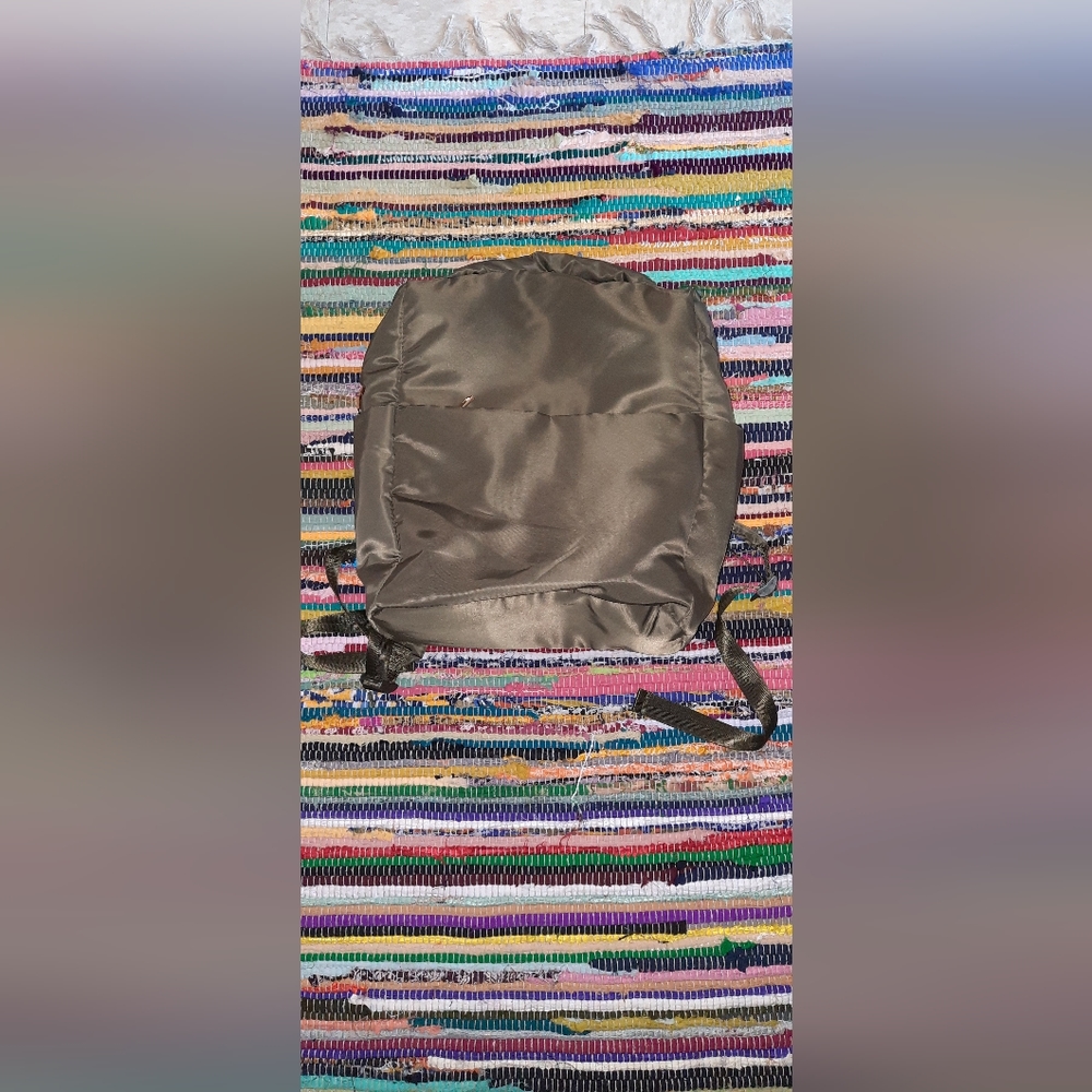 Green backpack a .new day